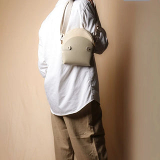 Off-White Canvas and Leather Crossbody Sling: Olivia